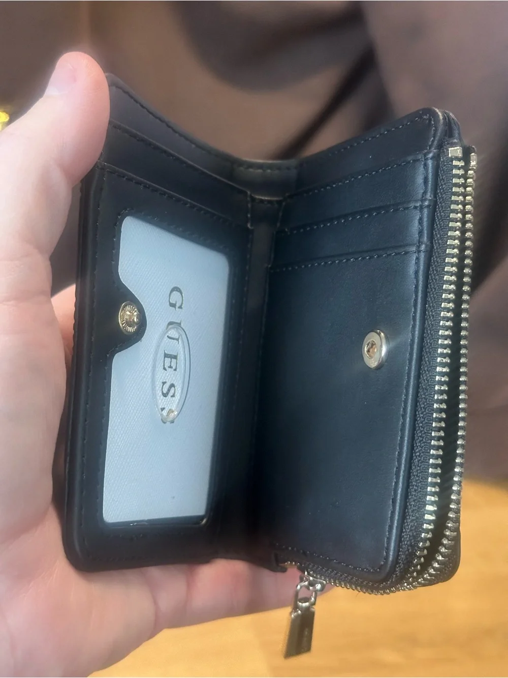 Guess compact bifold